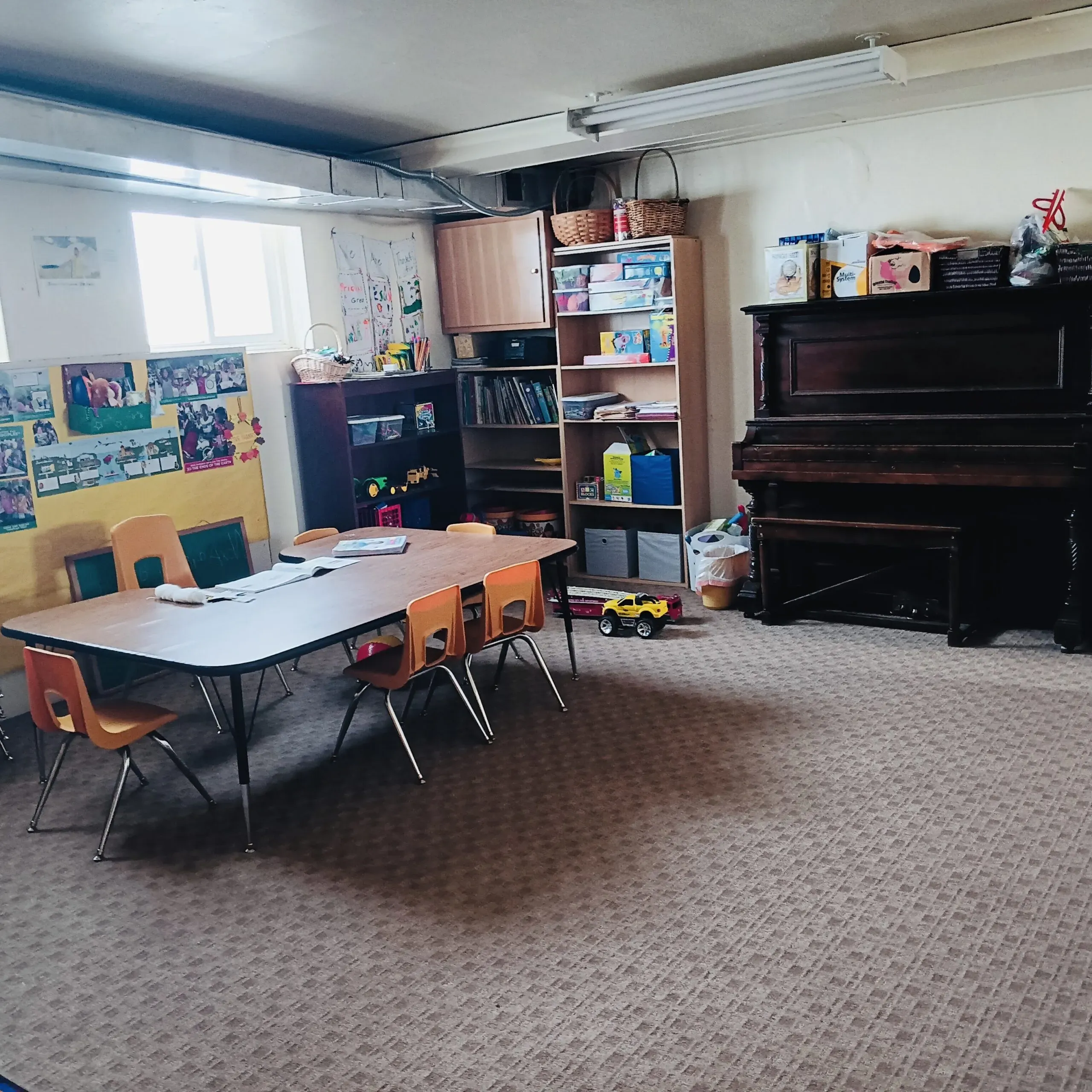 Children's Sunday School room with table and piano