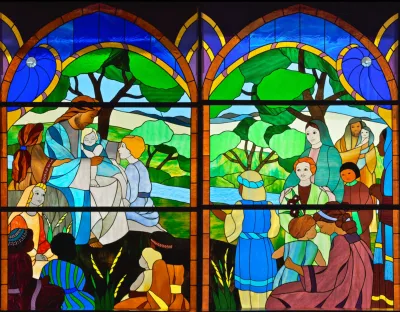 Stained glass gathering by a river